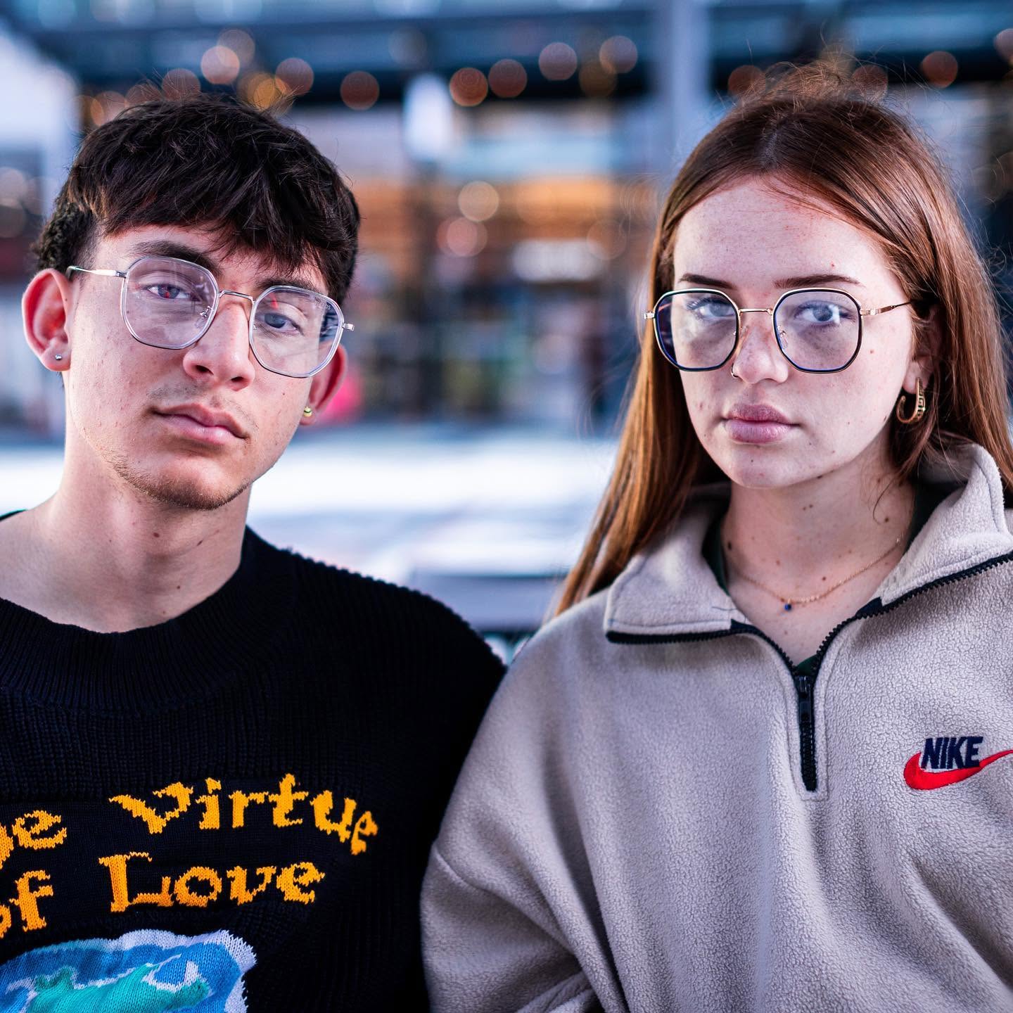 Two models wearing metal-framed BleFos glasses